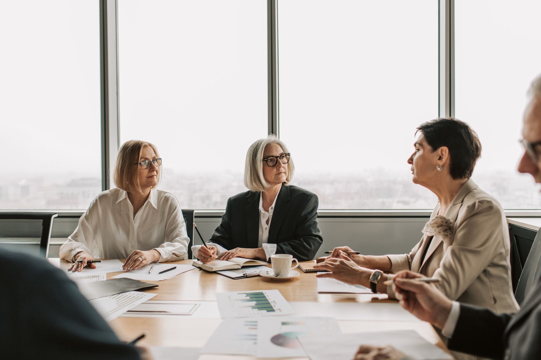 Senior executives around a boardroom table